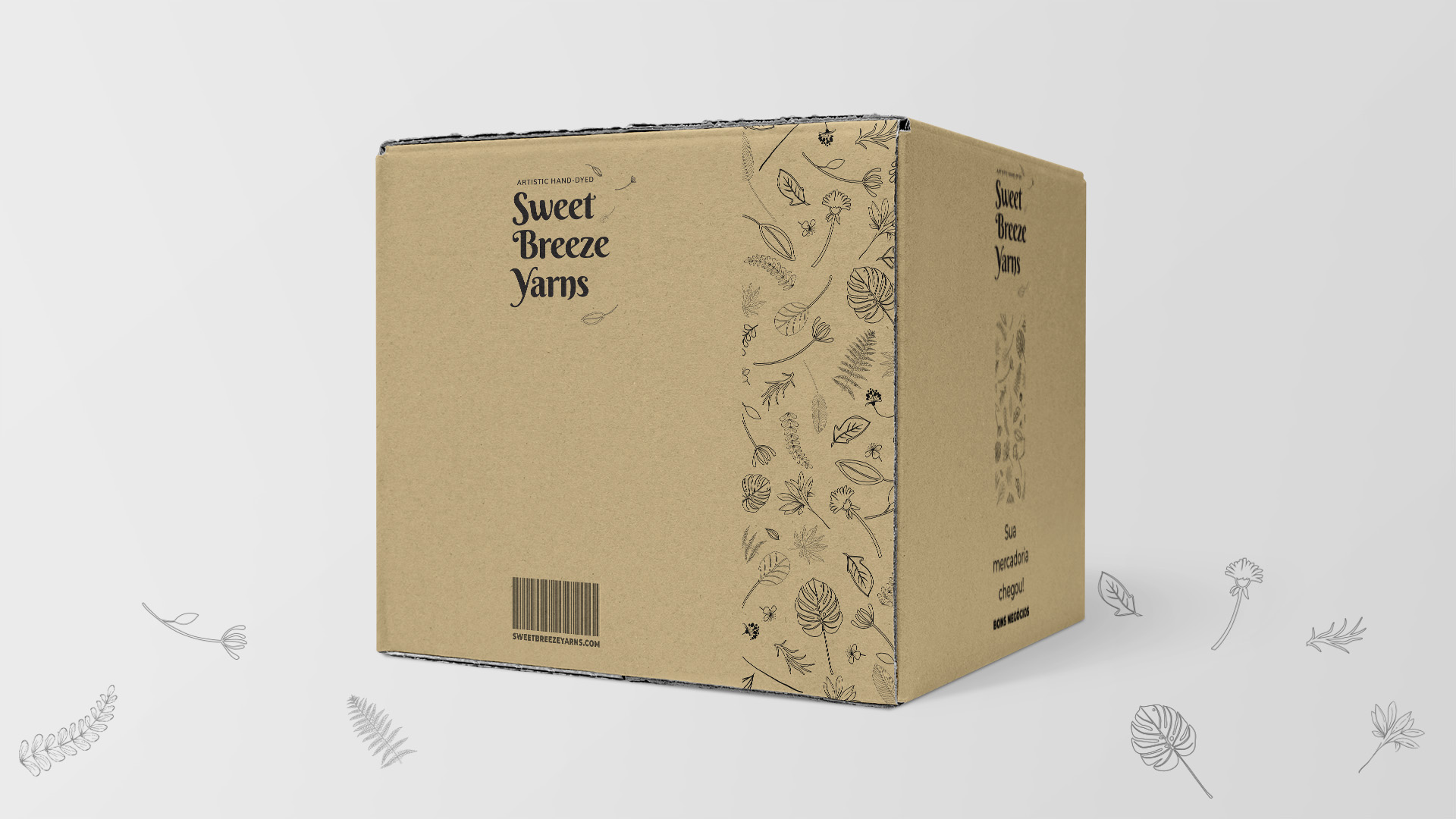 Imagem de caixa master de papelão para envio de produtos com identidade visual Sweet Breeze Yarns.